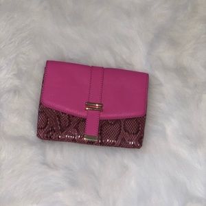 Pink clutch bag